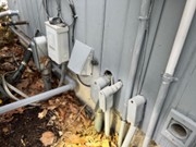 Open electrical lines and an uncapped vent, which would easily allow for rodent entry